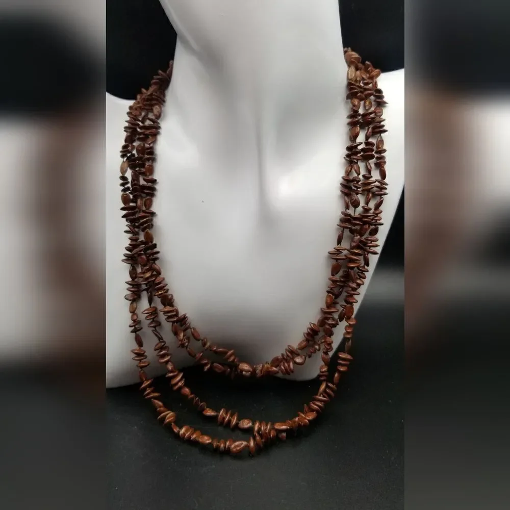 Coco nut beaded mocha triple layered necklace. N206